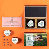 Front view of 1st birthday invitation card sample in a wooden 2-chocolate box